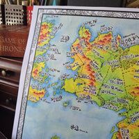 Load image into Gallery viewer, Map of Essos from 'A Game of Thrones' with colorful topography and fancy text.
